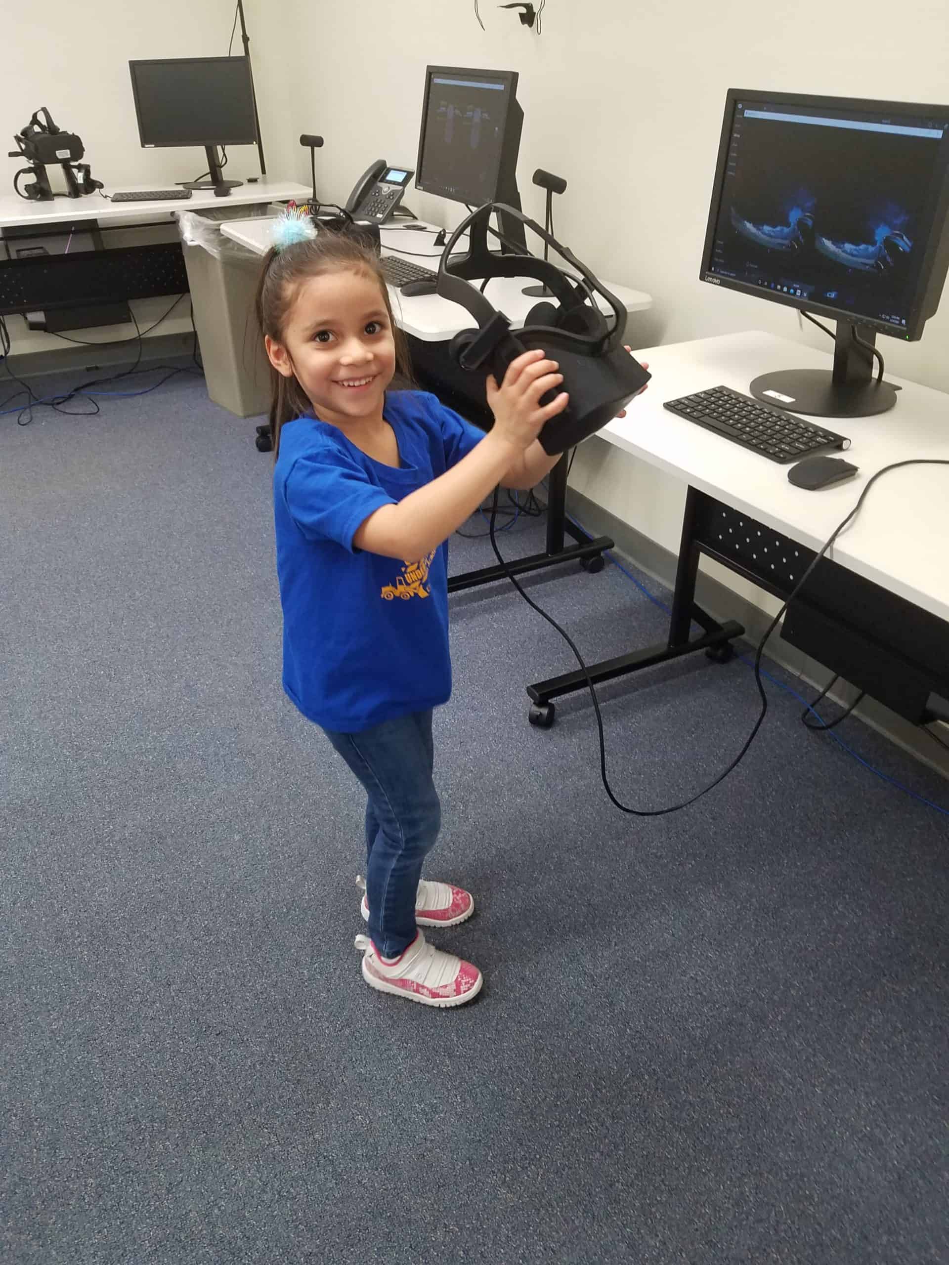 A little girl just experienced her first Virtual Reality Lesson